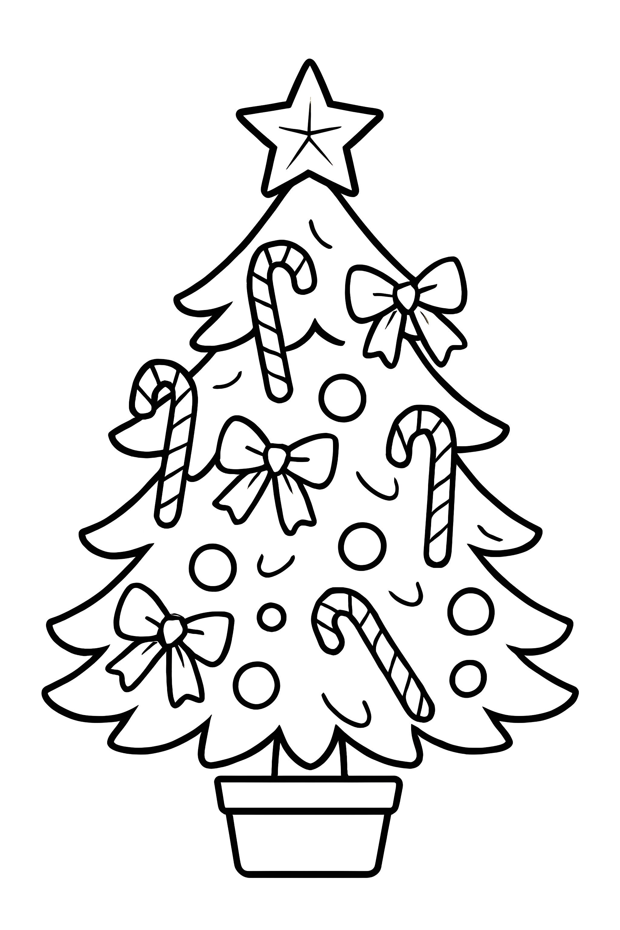 A small tabletop Christmas tree adorned with candy canes and bows in a decorative pot